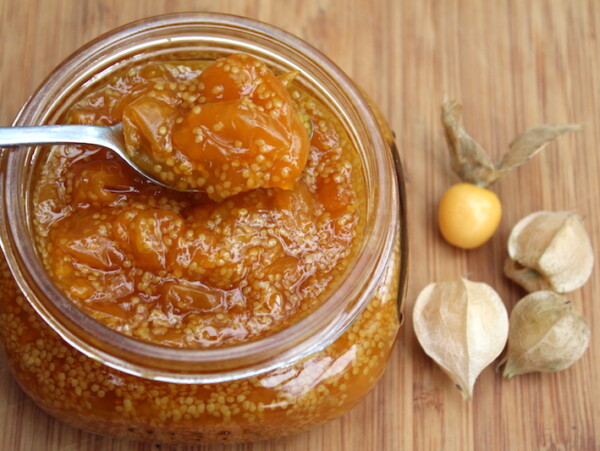 Open jar of homemade husk cherry jam