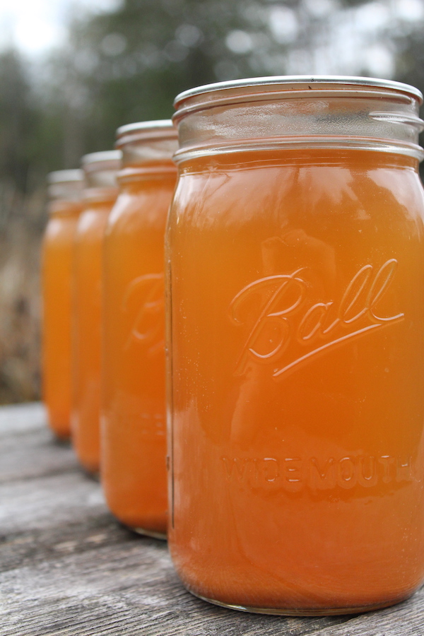 Four jars of home canned apple cider