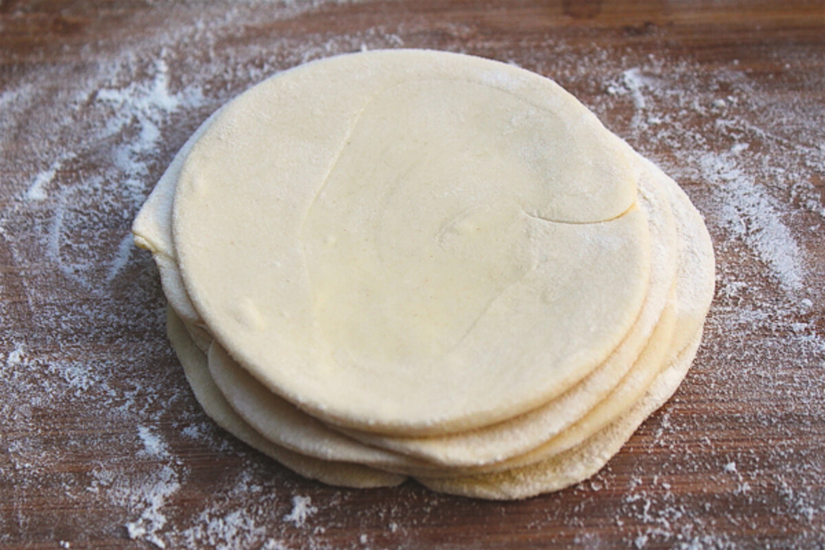 rolling out dumpling wrappers