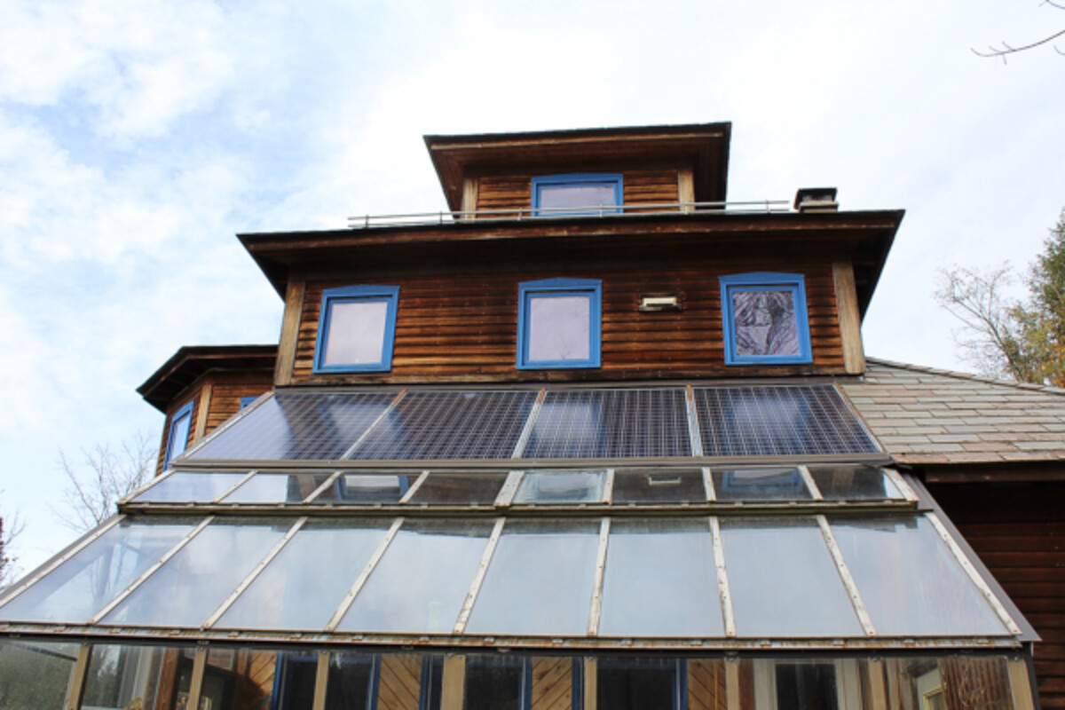 solar panels on attached greenhouse
