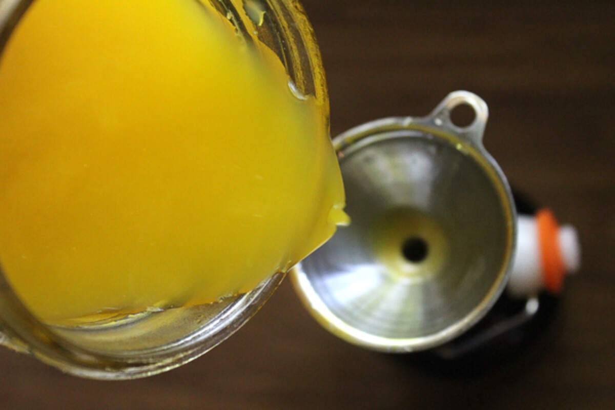 Bottling homemade mango wine