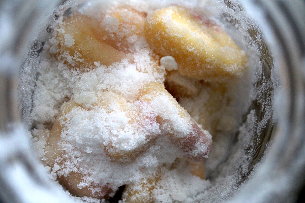 Juicing Peaches with Sugar for Wine