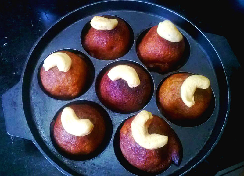 Unni Appam with cashews on top