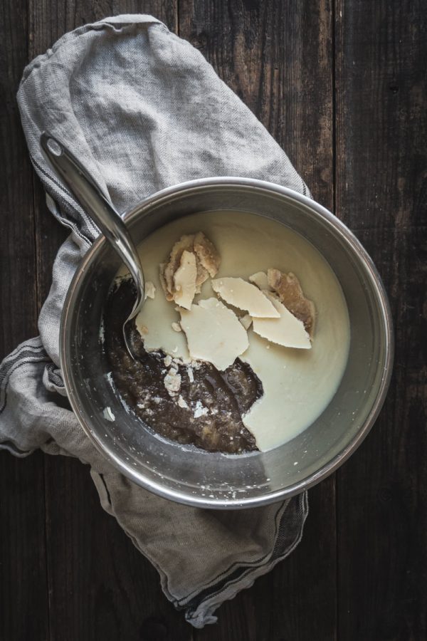 a bowl of bone broth, cooled with a layer of fat