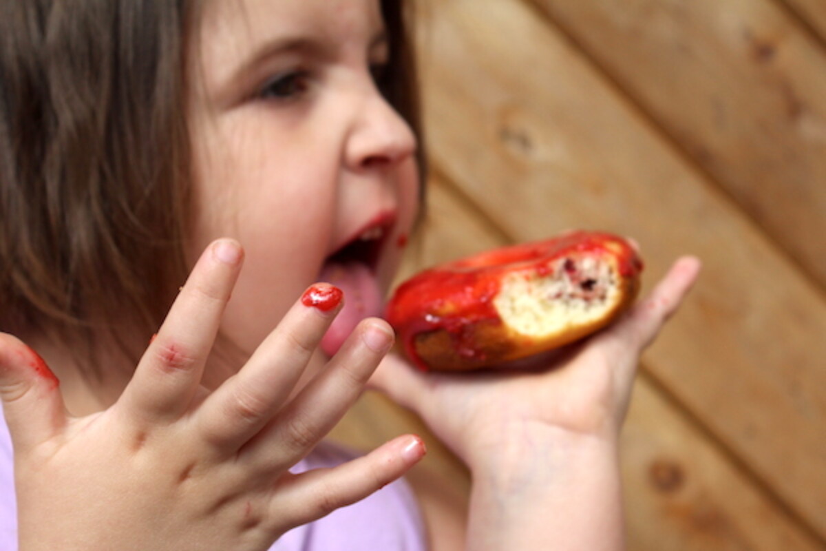 Child eating post apocalyptic donut