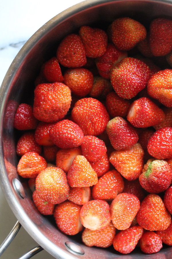 Hulled strawberries in a pot for Jelly