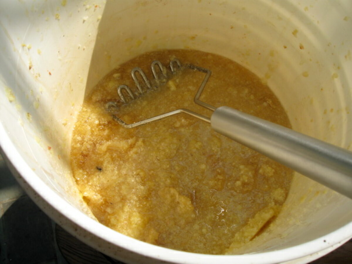 Mashed honey comb in the first stage of honey extraction
