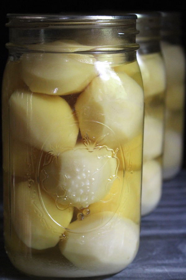 How to Can Potatoes at Home ~ Making shelf stable home canned potatoes in a pressure canner.
