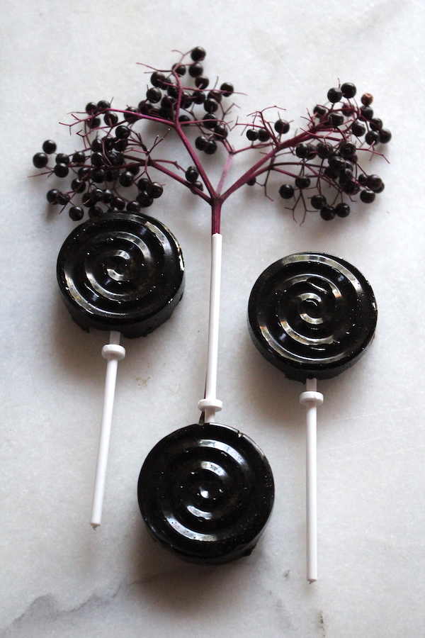 Homemade elderberry lollipops made with elderberry syrup