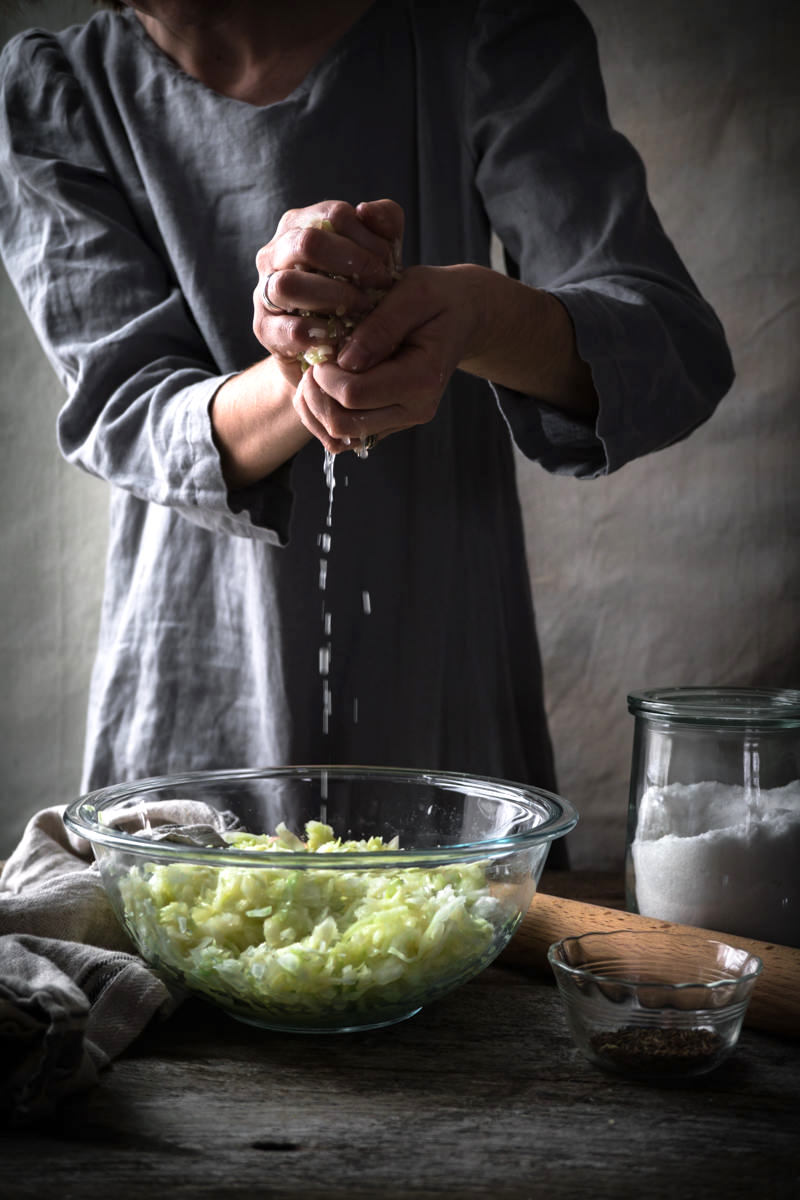 Manually Pounding Sauerkraut