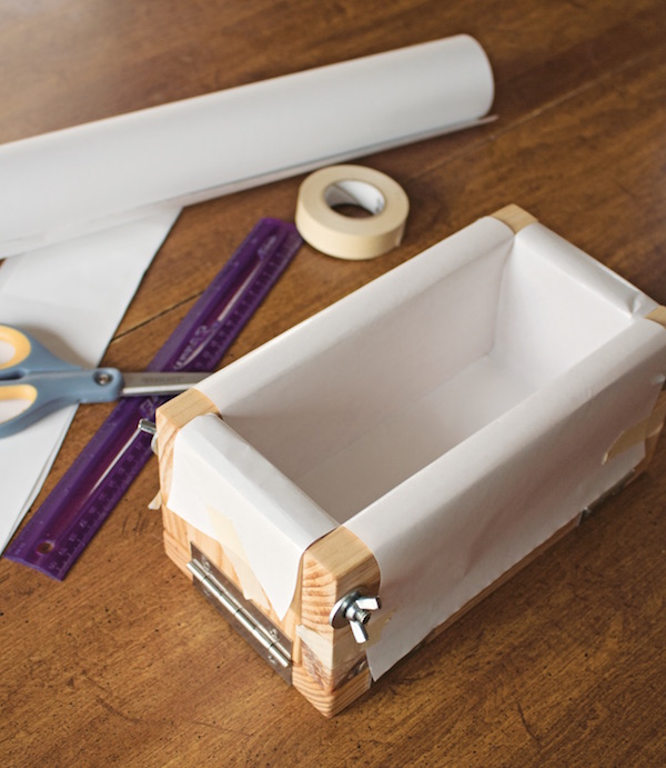 A wooden soap mold lined with parchment paper (Photo Credit Jan Berry)