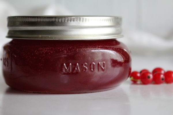 Home canned redcurrant jelly in a mason jar