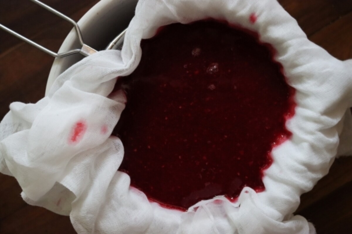 Straining Raspberry Juice for Raspberry Wine