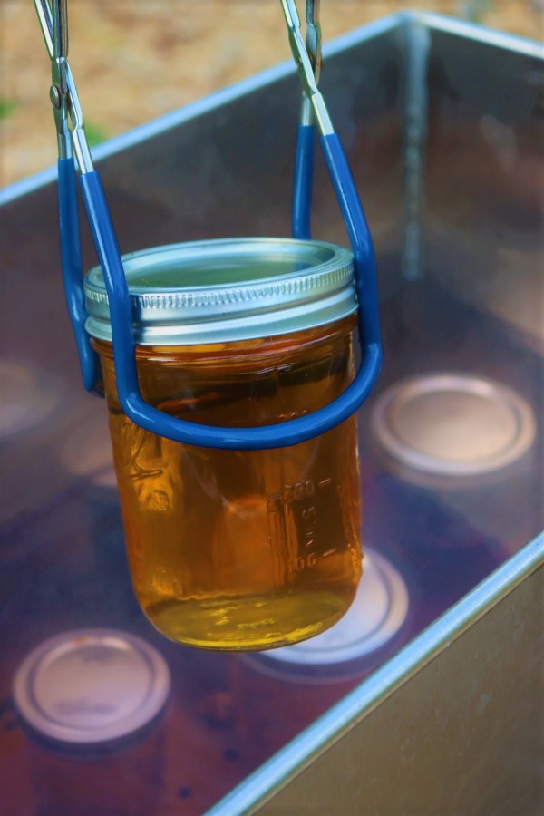 Canning Apple Juice outdoors using an amish style canner