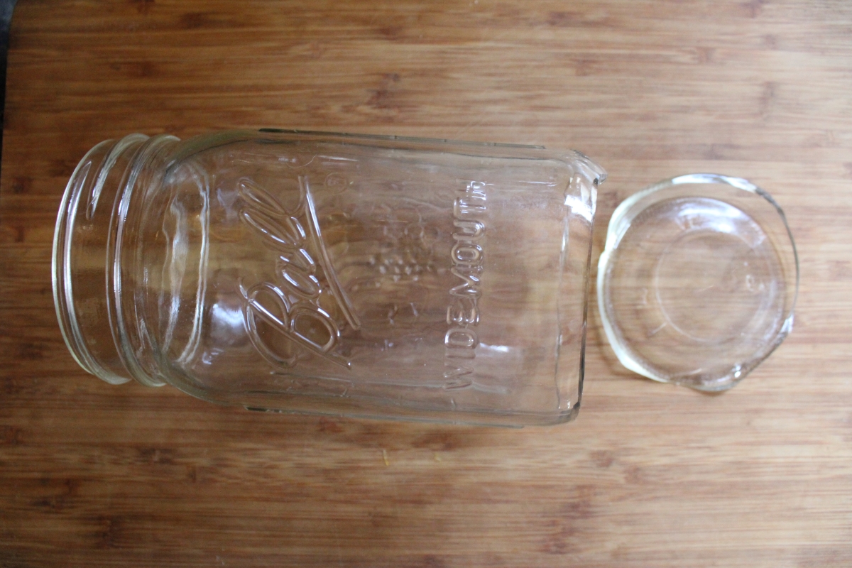 A broken canning jar caused by thermal shock.