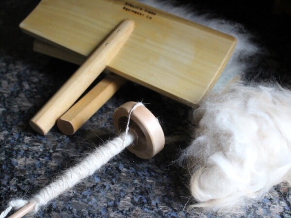 Spinning angora on a drop spindle