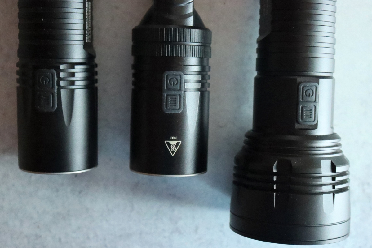 Side button controls on Flashlights are difficult to find in the dark or while wearing gloves.