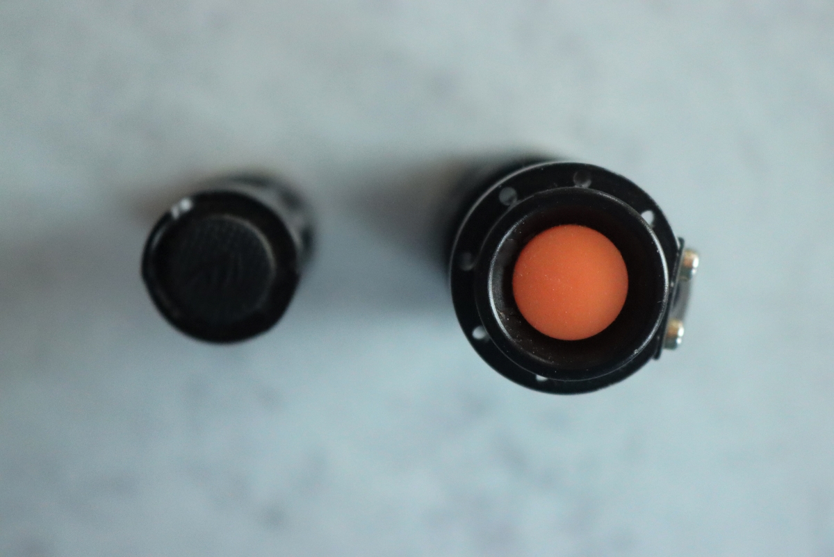 Flashlight Thumb Controls on two small, easy to use every day carry flashlights