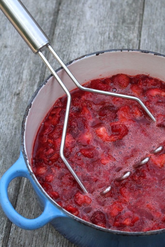 Mashing Strawberries for Strawberry Jam
