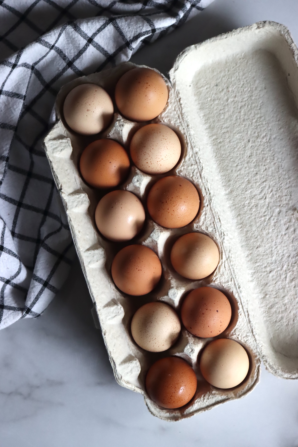 Various shades of brown and speckled eggs
